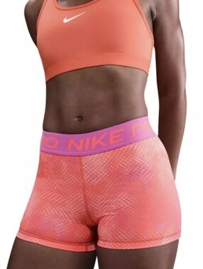 Nike Orange Sports Bra and Coral Compression Shorts